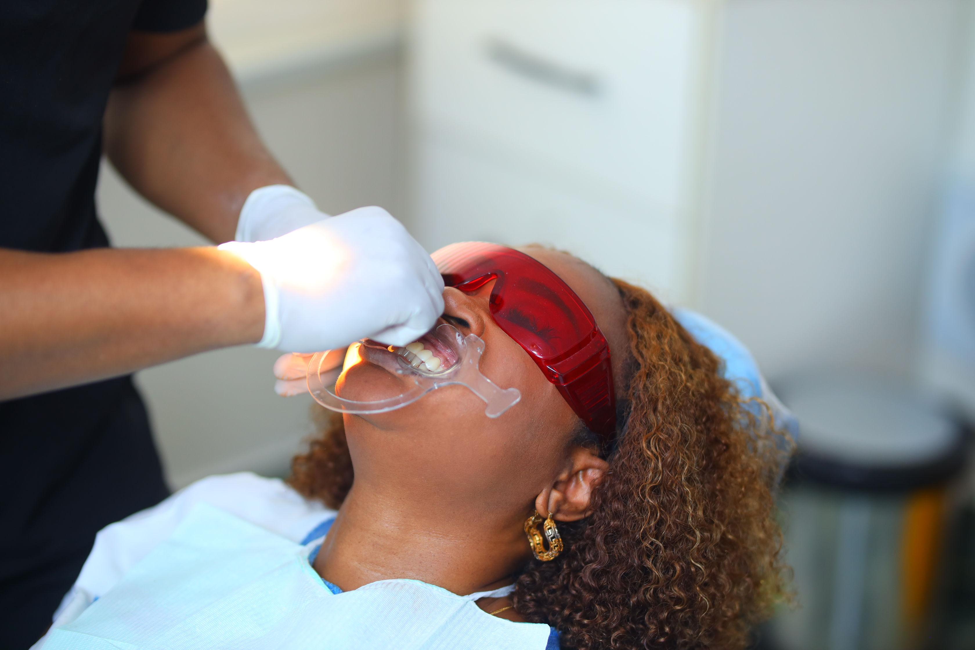 Dental professional supporting a patient during a dental visit